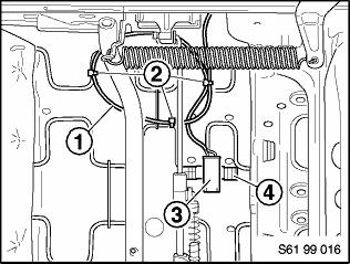 4. Remove cable securing wire ties, unplug the belt tensioner connector from the belt buckle assembly and from the seat wiring harness connector.
