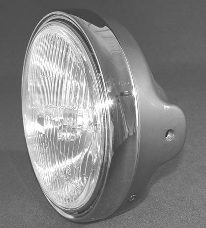 39 CHROME 7" HEADLIGHT 7" Chromed steel Headlight with Diamond Cut Type Lamp assembly & 60/55 watt Halogen Bulb.