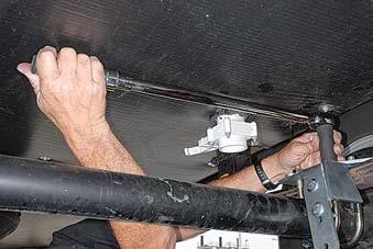 Use an alternating cross pattern with an accurate torque wrench.