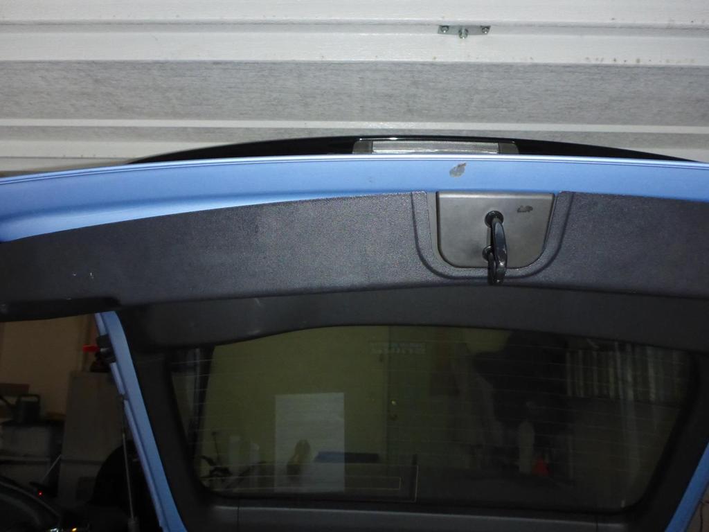 Metal loop thingy on the hatchback door that goes into the latching mechanism Don t bend too much here and here As you re popping that lower panel off, it would be easy to
