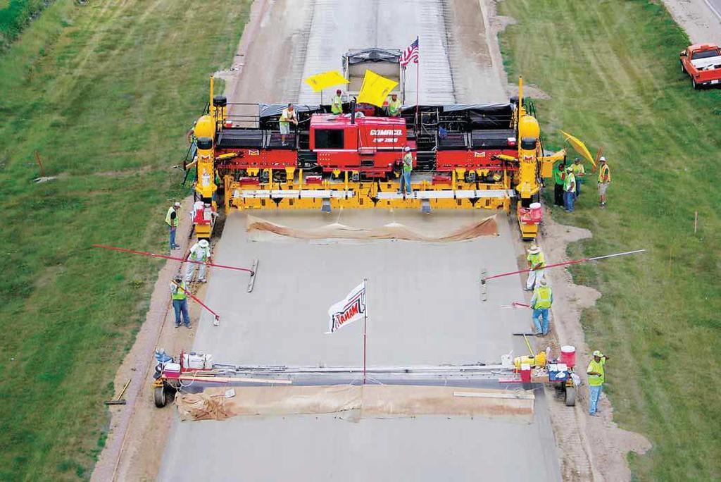 H a"b!a$10 The GOMACO four-track GHP-2800 paver slipforms a 34 foot (10.36 m) wide overlay and ß ying shoulders. In a single paving pass, the GHP-2800 is slipforming two 12 foot (3.