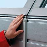 For doors with widths from 5510 mm, the threshold is approx. 13 mm. The garage door does not need to be opened for pedestrian traffic.