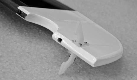 Check the fit of the fin's bottom surface, where it contacts the stab and fuselage. It should contact these surfaces from front to rear.