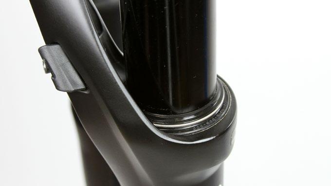 Make sure both dust wiper seals slide onto the tubes without folding the outer lip of either seal.