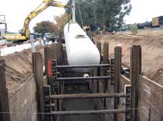 Louis, Waite Park, MN Project: Sewer Storage Tank, Sacramento, Calif. Challenge: Shore deep pit with clearance for 64 ft.