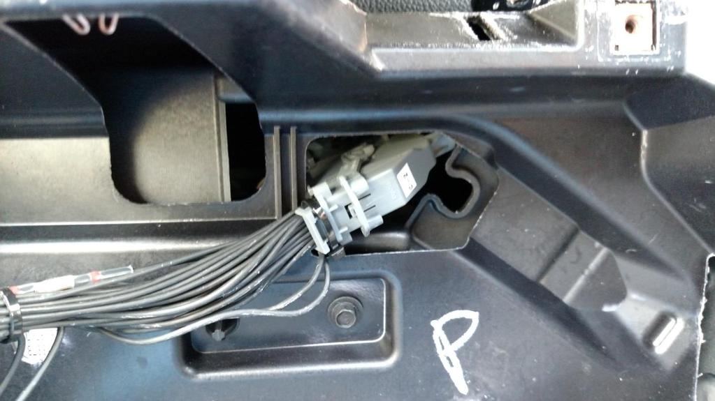12. The Inline-Speedometer harness and module must be tucked away