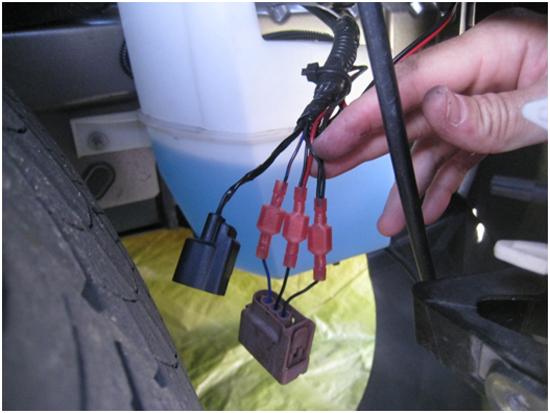 6. Twist the black (ground) cable of the Halo and parking light together and place them in a wire connector. 7. Use a voltage meter to test which wire powers the parking light.