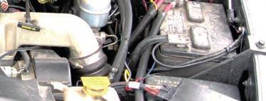 Locate and remove Fuses 28 and 35 (10 Amp) from inside the engine compartment fuse panel. 4. Insert the Leaded Fuse Link.
