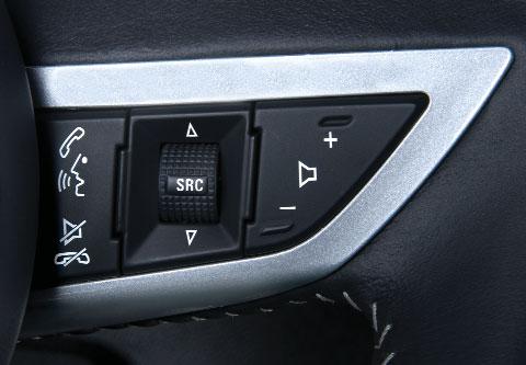 AUDIO STEERING WHEEL CONTROLSF + Volume Press + or to increase or decrease the volume. Next/Previous Rotate up or down to go to the next or previous favorite radio station, CD track, or MP3 file.