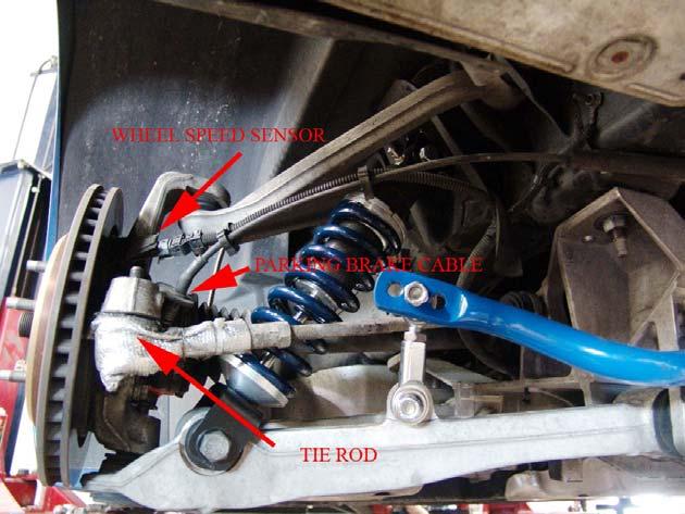 Next you will need to free the spindle from the car by removing the wheel speed sensor