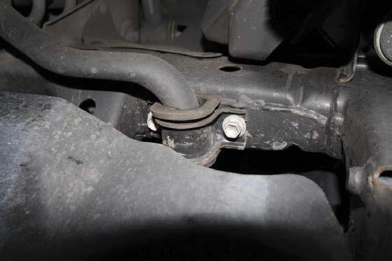 Thus remove the 2 bolts to the rear and then undo the 2 front, but don