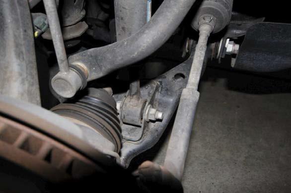 6. Use a tie rod puller to separate the tie rod form the spindle.