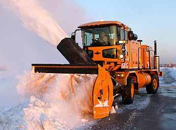 This heavy-duty snow blower, powered by a CAT C-18 Engine, and a Logan LC-314 Bell