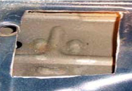 Place the two SQUARE steel plates in the trunk floor as per picture shown. Draw a line around the steel plate. Make another line about ¼ inside the line just drawn.