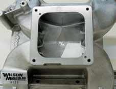 TRICK FLOW HEADS Part Three 1. Wilson did a fantastic job porting our M1 intake. The runners were opened up significantly and the entire interior was given a uniform surface finish. 2.