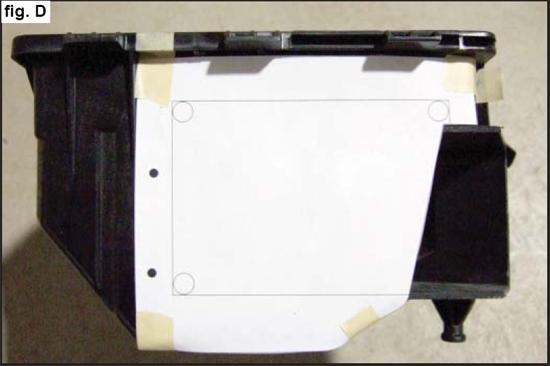 Align the template with the second rib from the left of the air box and the bottom of the top lip as shown in Fig. D.
