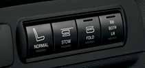 Use the memory controls located on the driver s door to program and then recall memory positions. To program position 1, press and hold the 1 button until you hear a chime.