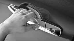 To lock the vehicle, push either door handle request switch once or press the button on the key fob.