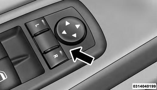 86 UNDERSTANDING THE FEATURES OF YOUR VEHICLE Power Mirrors The power mirror controls are located on the driver-side door trim panel.