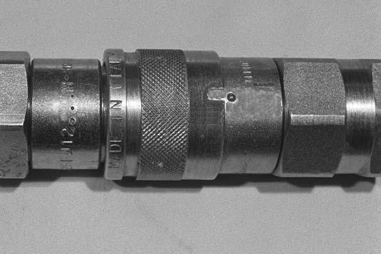 2 Install the male coupler into the female coupler. Full connection is made when the ball release sleeve slides forward on the female coupler. N 5540 To Disconnect: Hold the male coupler.