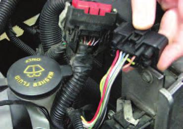 05 and 06 applications should trim enough electrical tape from the harness behind the chassis side connector (closest to the radiator) to pull out 2 of wire from the convoluted tubing.