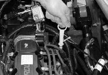 MAINTENANCE LUBRICATION ENGINE Check the engine oil level daily. Change the engine oil and oil filter every 100 hours of machine operation.