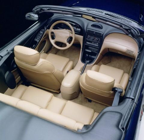 1994: The launch of the fourth-generation Mustang included a nod to the original 1964 pony car, with a twin cockpit layout and sculpted modern styling for the steering wheel and airbag.