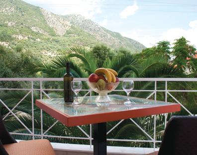 Overlooking the mountain and the garden, the air-conditioned apartments of