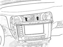 iv. Route the opposite end of the harness under the passengers side air duct to the glove box location. (Fig. E2) v.