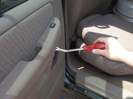 Removal Instructions STEP 1: Using a trim panel removal tool, release the power switch assembly from the interior door trim panel.
