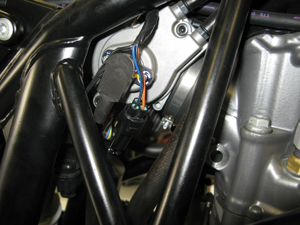 From here the harness will branch out to each individual connection point. 5. The throttle position sensor can be found to the right of the airbox.