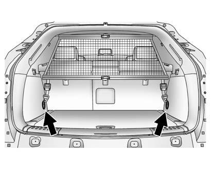 3. Mount the cargo net to the rear seat tethers on the back of the folded down rear seats and pull on the straps