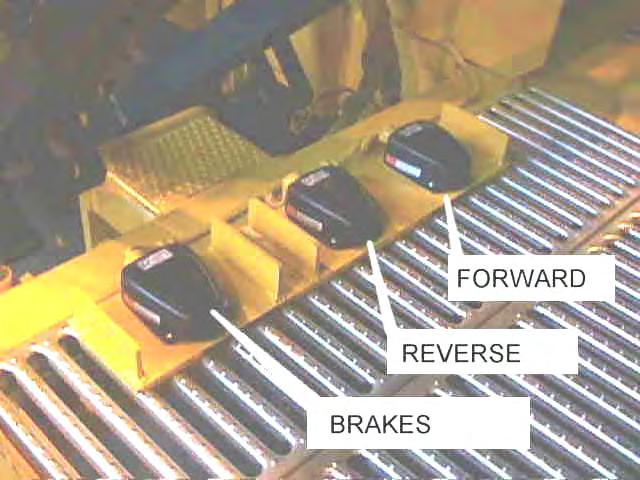 Spike Puller SP2R Model A PRE-OPERATION FIG 7. OPERATOR CONTROLS PROPULSION AND BRAKING The type of braking is selected on the Main Control Panel of the Logic Box.
