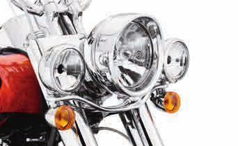 LIGHTING 645 Headlamps Auxiliary C. DELUXE AUXILIARY LIGHTING KIT FL SOFTAIL MODELS Shaped by the wind.