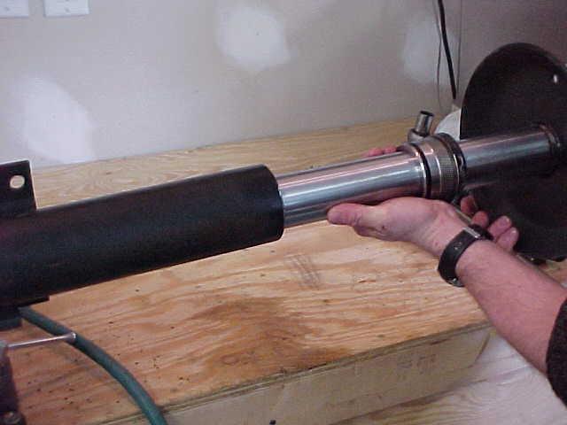 CYLINDER. STEP 20 - INSERT THE ROD ASSEMBLY BACK INTO THE CYLINDER.