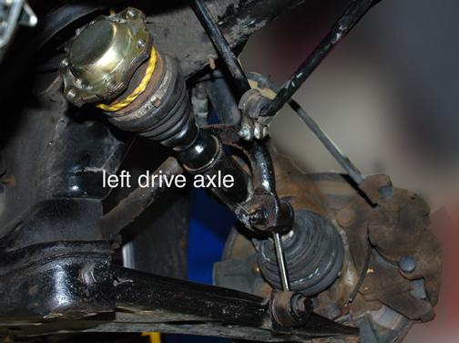 Under the Car Quick Tip Need a fast and easy way to hold the drive axles as you loosen or tighten the drive axle bolts?