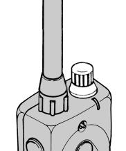 Located on the side of the transmitter, the receptacle is covered by a rubber plug.