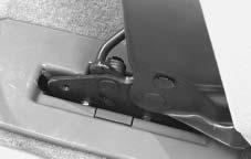 If the front hooks are not attaching correctly, check that the seat is in the full rear position. 3. Firmly push the rear hooks onto the rear floor pins by pushing down the rear of the seat.