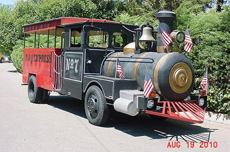 Lot #625 0000 SPECIAL CONSTRUCTION ROAD RUNNING TRAIN VIN C6336Z172723 Wonderful parade train on 24' truck chassis, seats 12 people, road licensed, original bell, steam whistle and gauges.