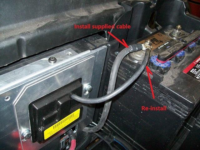 The cable is routed through the plate s side access cutout. 9.