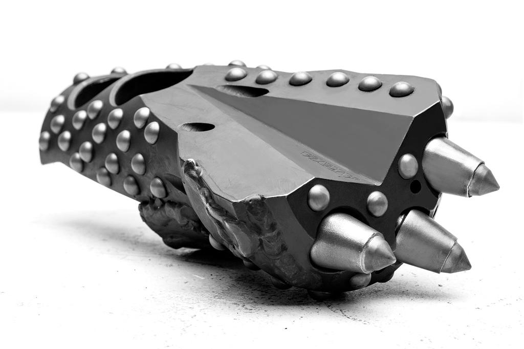 BULLET BIT An Aggressive Design for Hard Rock The strongest bit retention system on the market, the patented Retainer Boss/Cross Pin design eliminates one of the weakest points of traditional drill