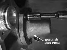 Fig. 14 19. Remove the input shaft rear cap from housing. See Fig. 15. Fig. 16 22.