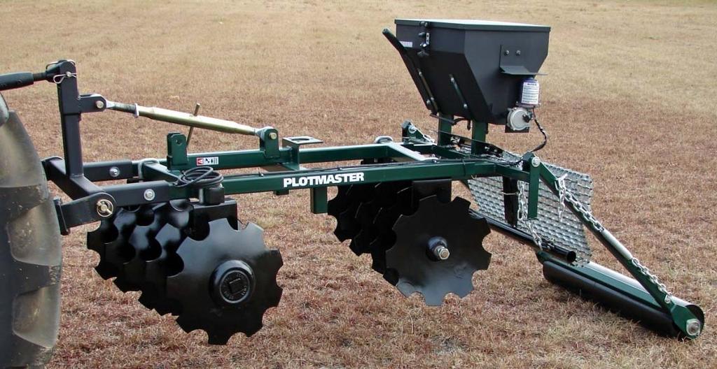 PM 301 Plotmaster Hunter 300 3 Tractor Model standard 3 point Characteristics: Front and Rear Disk Gang, Seed gate handle on Seeder box, Tandem Cultipacker/Drag (can use