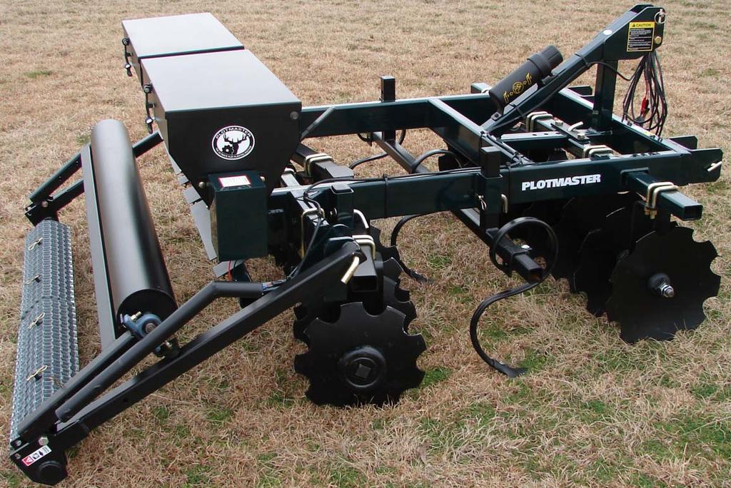 standard 3 point Characteristics: Front and Rear Disk Gang, Center Plow Bar, Dual Seed gate handle on Seeder box, Tandem Cultipacker/Drag (can use at the same time or