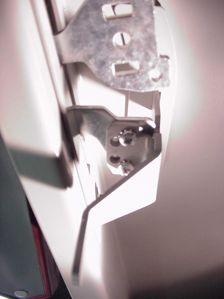 Using the Allen Bradley handle: Installed: Install the bracket using these two threaded holes and the