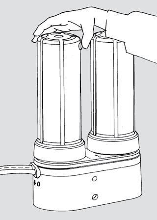 III. Installation (continued) 13. Push in the red pressure release valve located on the pre-filter housing (see figure 11) to allow air to escape. When only water starts to escape, release the valve.