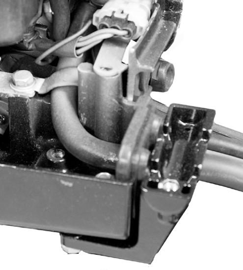 ENGINE INSTALLATION 4. Reinstall the cable receptacle bracket with two bolts and hex nuts. Tighten the bolts to the specified torque. a a - Cable receptacle bracket 29044 Description Nm lb. in. lb. ft.