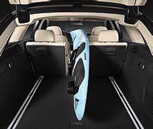 Luggage compartment dividing net helps to prevent objects from falling into the passenger compartment under heavy braking.