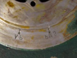 point marked AP on the front of the flywheel housing.