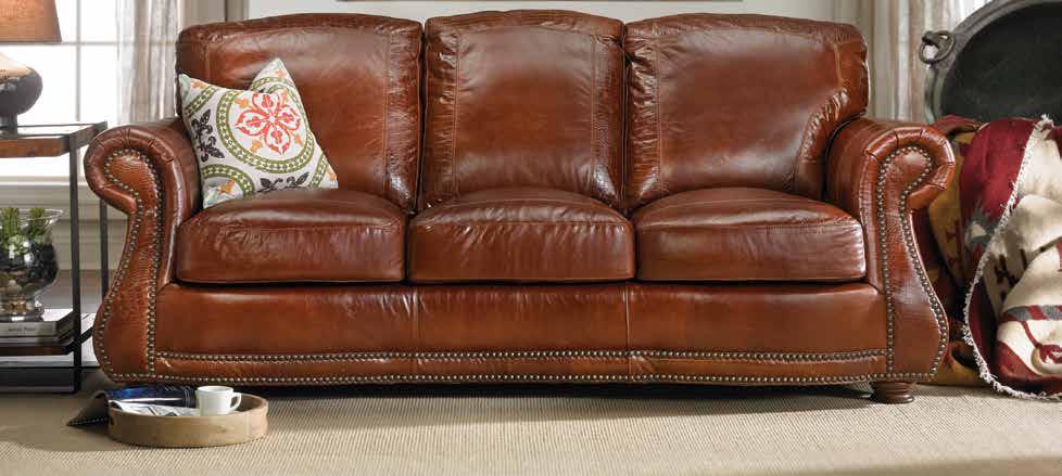 THE ROCKY MOUNTAIN LEA T H ER C OMP ANY $1495 Market price: $3400 top-grain Leather & Feather croc embossed Sofa Croc embossing